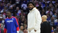 Joel Embiid #21 of the Philadelphia 76ers looks on during a timeout against the Milwaukee Bucks in the first half at the Wells Fargo Center on October 23, 2024 in Philadelphia, Pennsylvania. (Photo by Mitchell Leff / GETTY IMAGES NORTH AMERICA / Getty Images via AFP)
