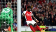 Arsenal's English midfielder #07 Bukayo Saka scores the team's first goal during the English Premier League football match between Arsenal and Liverpool at the Emirates Stadium in London on October 27, 2024. (Photo by Adrian Dennis / AFP) 