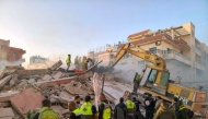 Rescuers search for survivors at the site of an Israeli airstrike that targeted overnight the southern Lebanese city of Tyre on October 28, 2024. (Photo by Kawnat Haju  / AFP)