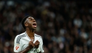 Real Madrid's Brazilian forward #07 Vinicius Junior reacts during the Spanish league football match between Real Madrid CF and FC Barcelona at the Santiago Bernabeu stadium in Madrid on October 26, 2024. (Photo by OSCAR DEL POZO / AFP)
