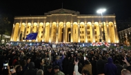 Georgian opposition supporters rally to protest results of the parliamentary elections that showed a win for the ruling Georgian Dream party, outside the parliament building in central Tbilisi on October 28, 2024. (Photo by Giorgi Arjevanidze / AFP)