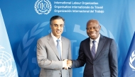 Minister of Labour H E Dr. Ali bin Smaikh Al Marri meeting with Director-General of the International Labour Organization H E Gilbert Houngbo in Geneva, yesterday.
