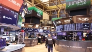 A file photo of traders working on the floor of the New York Stock Exchange during morning trading in New York City, US. (AFP)