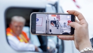 Republican presidential nominee Donald Trump holds a press conference from inside trash hauler at Green Bay Austin Straubel International Airport on October 30, 2024. Chip Somodevilla/Getty Images/AFP 