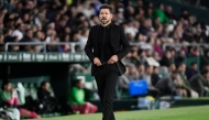 Atletico Madrid's Argentine coach Diego Simeone walks along the touchline during the Spanish league football match between Real Betis and Club Atletico de Madrid at the Benito Villamarin stadium in Seville on October 27, 2024. Photo by CRISTINA QUICLER / AFP.