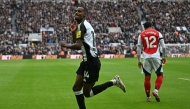 Newcastle United's Swedish striker #14 Alexander Isak celebrates after scoring the opening goal of the English Premier League football match between Newcastle United and Arsenal at St James' Park in Newcastle-upon-Tyne, north east England on November 2, 2024. (Photo by Paul ELLIS / AFP) 