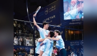 Argentina players celebrate after defeating Spain in the men's final.