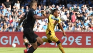 Atalanta's Nigerian forward #11 Ademola Lookman (R) kicks the ball to score his team's opening goal during the Italian Serie A football match between SSC Napoli and Atalanta at the Diego Armando Maradona stadium in Naples, on November 3, 2024. (Photo by CARLO HERMANN / AFP)