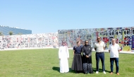 Chairperson of Qatar Museums H E Sheikha Al Mayassa bint Hamad bin Khalifa Al Thani and internationally acclaimed artist Rashid Johnson with other officials during the unveiling of the public artwork Village of the Sun.