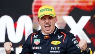 Red Bull Racing’s Dutch driver Max Verstappen celebrates after winning the Formula One Sao Paulo Grand Prix, on November 3, 2024.