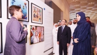 Minister of State for International Cooperation H E Lolwah bint Rashid Al Khater with other officials during the exhibition.