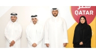 Sheikh Abdulaziz bin Saoud Al Thani (second left) poses with other officials after his re-election as QCA president.   