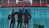 File photo: General view of the United Trinity statue outside Old Trafford. REUTERS/Phil Noble

