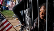 Howard University student Danielle Munford listens to polling results during an election night event on November 05, 2024 in Washington, DC. Brandon Bell/Getty Images/AFP 