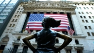 The “Fearless Girl” a bronze sculpture by Kristen Visbal, stands across from the New York Stock Exchange (NYSE) building in the Financial District in New York City on November 6, 2024. (Photo by TIMOTHY A. CLARY / AFP)
