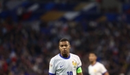 (FILES) France's forward #10 Kylian Mbappe looks on during the UEFA Nations League, League A - Group 2 first leg football match between France and Belgium at the Parc Olympique Lyonnais in Lyon on September 9, 2024. (Photo by Franck FIFE / AFP)
