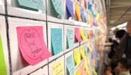 People leave post-it notes as they take part of the Subway Therapy project are pictured at the 14th St/6th Ave station bypass in New York City on November 8, 2024. (Photo by Diane Desobeau / AFP)