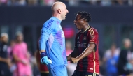 Brad Guzan #1 and Ajani Fortune #35 of Atlanta United celebrate after their team defeated Inter Miami on November 09, 2024 in Fort Lauderdale, Florida. Megan Briggs/Getty Images/AFP 