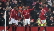 Manchester United's English striker #10 Marcus Rashford, Manchester United's Portuguese midfielder #08 Bruno Fernandes, Manchester United's Brazilian midfielder #18 Casemiro and Manchester United's Moroccan defender #03 Noussair Mazraoui celebrate their second goal during the English Premier League football match between Manchester United and Leicester City at Old Trafford in Manchester, north west England, on November 10, 2024. (Photo by Darren Staples / AFP) 