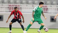 Action during the match between Al Ahli and Al Rayyan.