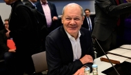 Germany's Chancellor Olaf Scholz takes his seat prior a SPD parliamentary group meeting at the Bundestag, Germany's lower house of parliament in Berlin, on November 12, 2024. (Photo by John MacDougall / AFP)