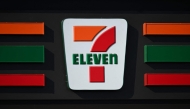 The 7-Eleven logo is displayed on a sign outside of a convenience store in Torrance, California on October 14, 2024. Photo by Patrick T. Fallon / AFP