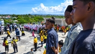 People take part in an earthquake and tsunami drills ahead of the 20-year anniversary of the Boxing Day disaster in Banda Aceh on November 13, 2024. (Photo by CHAIDEER MAHYUDDIN / AFP)