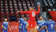 An Al Duhail player prepares to score a goal.