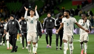 Players from Saudi Arabia react as they walk off the field on November 14, 2024. (Photo by William West / AFP)
