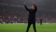 Manchester United's Dutch interim head coach Ruud van Nistelrooy acknowledges fans at the end of the English Premier League football match between Manchester United and Leicester City at Old Trafford in Manchester, north west England, on November 10, 2024. Photo by Darren Staples / AFP.