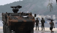 Soldiers patrol at Botafogo Beach as part of the security preparations ahead of the G20 Leaders Summit in Rio de Janeiro, Brazil, on November 16, 2024. (Photo by Pablo Porciuncula / AFP)