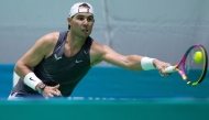 Spain's tennis player Rafael Nadal plays a return during a training session ahead of the Davis Cup tennis tournament at the Martin Carpena sportshall, in Malaga, on November 16, 2024. (Photo by Jorge Guerrero / AFP)
 