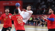 An Al Kuwait SC player prepares to shoot at the goal during the match against Al Rayyan.