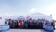 The participating officials pose for a photograph during the annual meeting of World Leagues Association in Cairo.