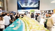 Participants visiting an exhibiting stand at Cityscape 2024.