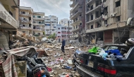 A man walks amid destruction in Beirut's southern Haret Hreik neighbourhood a day after an Israeli airstrike targeted the site, on November 18, 2024. (Photo by AFP)
