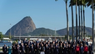 G20 leaders pose for a group photo at the G20 Summit in Rio de Janeiro, Brazil, on November 18, 2024. (Photo by Manuel Balce Ceneta / POOL / AFP)