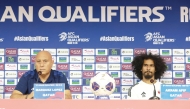 Qatar coach Marquez Lopez (left) and Akram Afif during a pre-match press conference yesterday.