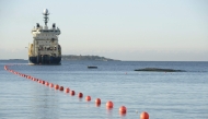 This picture taken on October 12, 2015 shows the C-Lion1 submarine telecommunications cable being laid to the bottom of the Baltic Sea by cable laying ship 