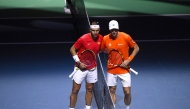 Spain's Rafael Nadal and Netherlands' Botic van de Zandschulp pose prior the quarter-final singles match between Netherlands and Spain during the Davis Cup Finals at the Palacio de Deportes Jose Maria Martin Carpena arena in Malaga, southern Spain, on November 19, 2024. Photo by Jorge GUERRERO / AFP.