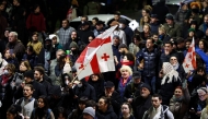 Georgian opposition supporters protest against the results of the last month's parliamentary elections in Tbilisi on November 19, 2024. (Photo by Giorgi ARJEVANIDZE / AFP)

