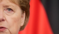 (Files) In this file photo taken on June 15, 2021, then German Chancellor Angela Merkel gives a press conference at the end of the second day of an EU summit at the European Council building in Brussels. (Photo by Stephanie Lecocq / Pool / AFP)