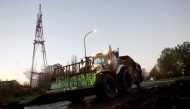 Photo used for demonstration purposes. A farmer on his tractor leaves the harbour of Bordeaux and its dam after the blockade by the Coordination Rurale hard-line farmers' union (CR) was lifted, near Bassens, southwestern France on November 22, 2024, opn the fifth day of the nationwide protests against pay and conditions and a prospective EU-Latin America trade deal. (Photo by ROMAIN PERROCHEAU / AFP)