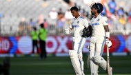 India's Yashasvi Jaiswal (L) and KL Rahul walk back to the pavilion at the end of the second day of the first Test cricket match between Australia and India on November 23, 2024. (Photo by Saeed Khan / AFP) 