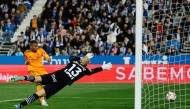 Real Madrid's French forward #09 Kylian Mbappe (left) scores the opening goal during the Spanish league football match between Club Deportivo Leganes SAD and Real Madrid CF at the Estadio Municipal Butarque in Leganes on November 24, 2024. (Photo by Oscar Del Pozo / AFP)