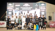 Qatar Racing Club Director H E Sheikh Jabor bin Khalid Al Thani poses for a photo with the podium winners. 
