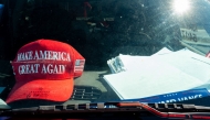 Apparel of U.S. President-elect Donald Trump is seen in the inside of a car near the Mar-a-Lago Club on November 25, 2024 in Palm Beach, Florida. Photo by Brandon Bell / GETTY IMAGES NORTH AMERICA / Getty Images via AFP.