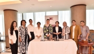 Vice Chairwoman of QBWA Aisha Alfardan, Chairman of the Surkhandarya region Oydin Sharafiddinova with other officials during signing of the MoU.