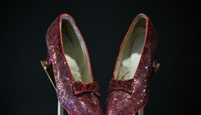 The ruby slippers worn by US actress and singer Judy Garland in the 1939 film The Wizard of Oz are pictured on display in London on November 27, 2024. (Photo by Justin Tallis / AFP)