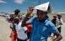 Voters queue at a polling station at the Sam Nujoma stadium in Windhoek on November 27, 2024 during Namibia's general election. (Photo by Simon Maina / AFP)